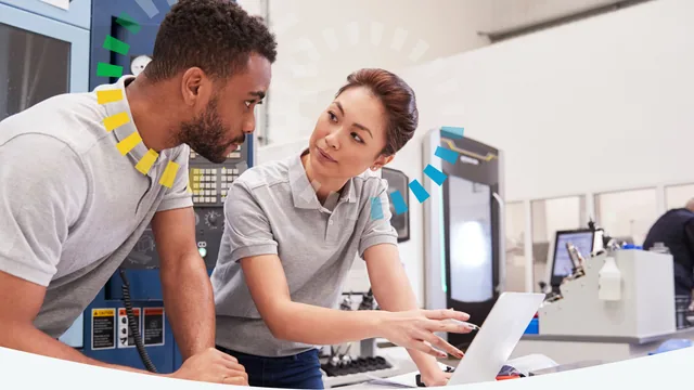 Two colleagues discussing their work, with Everything DiSC style illustrations